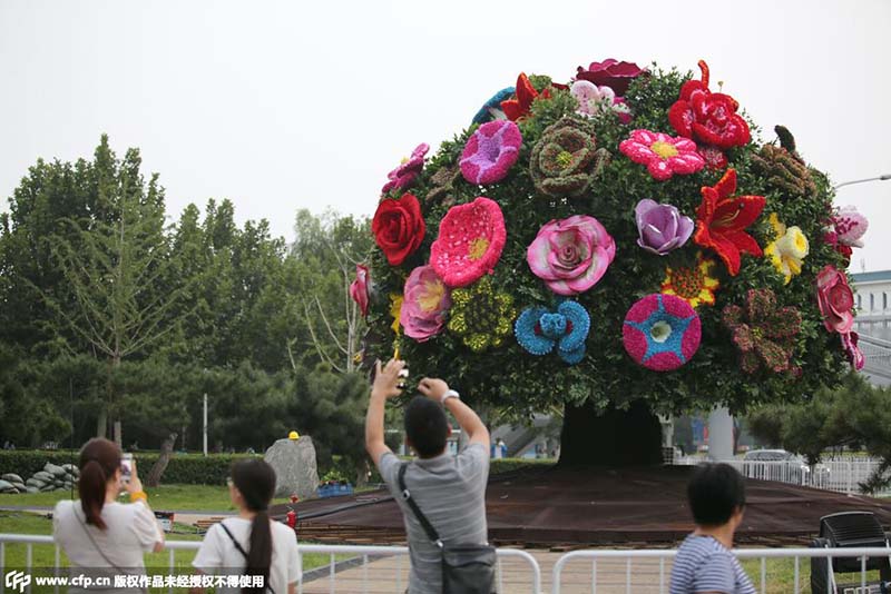 Canteiros de flores no centro de Beijing para celebrar aniversário da vitória contra agressão japonesa