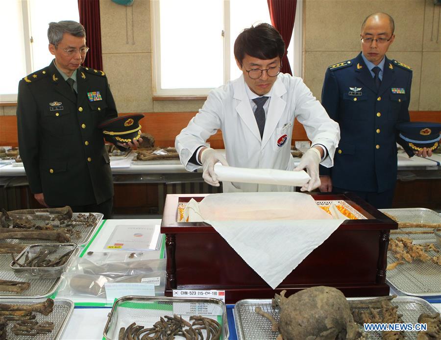 Restos mortais de soldados chineses mortos na Guerra da Coreia transladados para a China