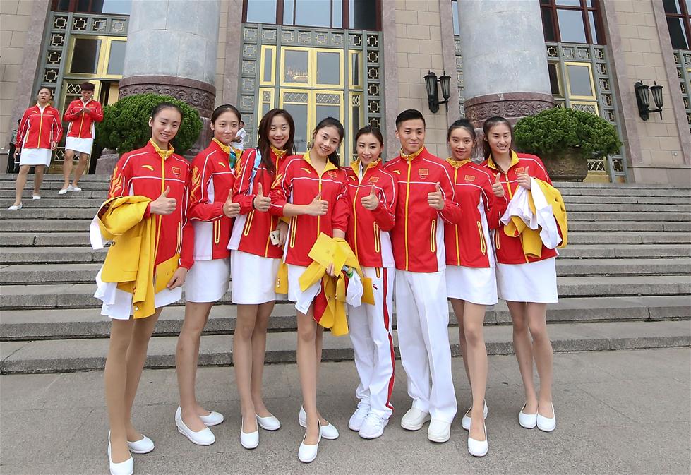 Delegação olímpica chinesa recebida em cerimônia no Grande Salão do Povo