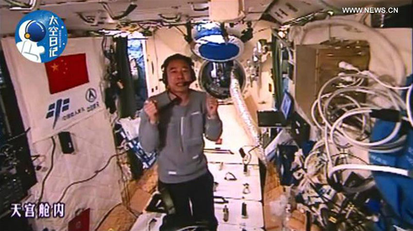 Diário de astronauta chinês no espaço: vestindo um traje espacial
