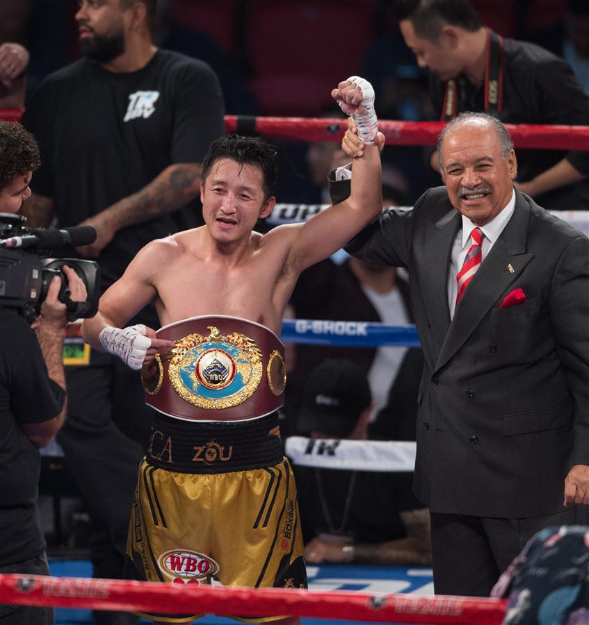 Chinês Zou Shiming é campeão mundial da categoria peso-mosca da WBO