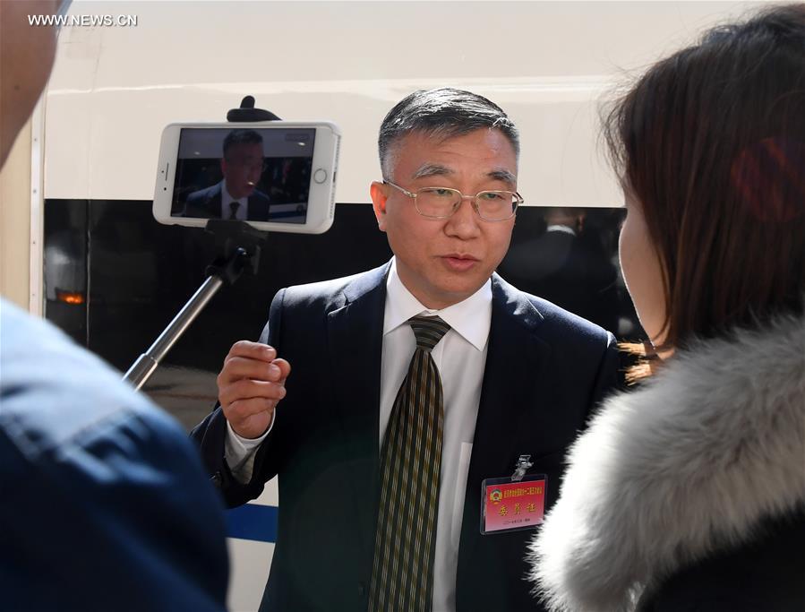 Assessores políticos chineses chegam a Beijing para reunião anual
