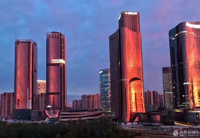 Beijing presenteada com crepúsculo “cinematográfico” após dia cinzento