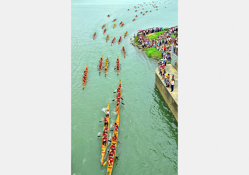 Celebrações do Festival do Barco-Dragão na China registradas em coleção fotográfica