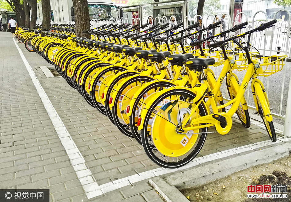 Bicicletas compartilhadas com novas grelhas eletrônicas para estacionamento em Beijing 