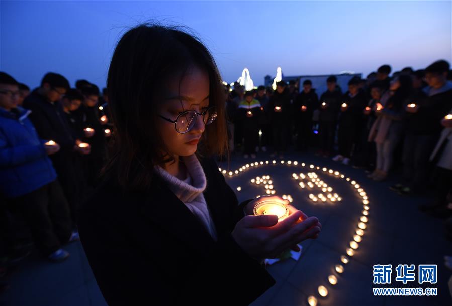 Estudantes universitários realizam atividades em memória do Massacre de Nanjing
