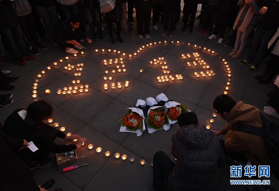 Estudantes universitários realizam atividades em memória do Massacre de Nanjing