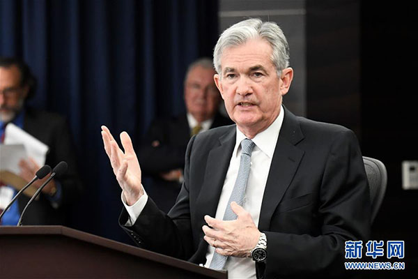 Reserva Federal dos EUA eleva taxa de juros e sinaliza mais dois aumentos de taxa em 2018