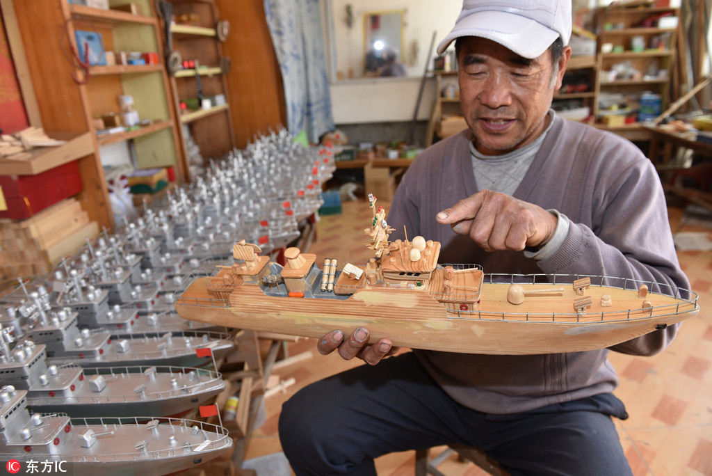 Pescador de Shandong dedica-se à criação de maquetes de navios de guerra