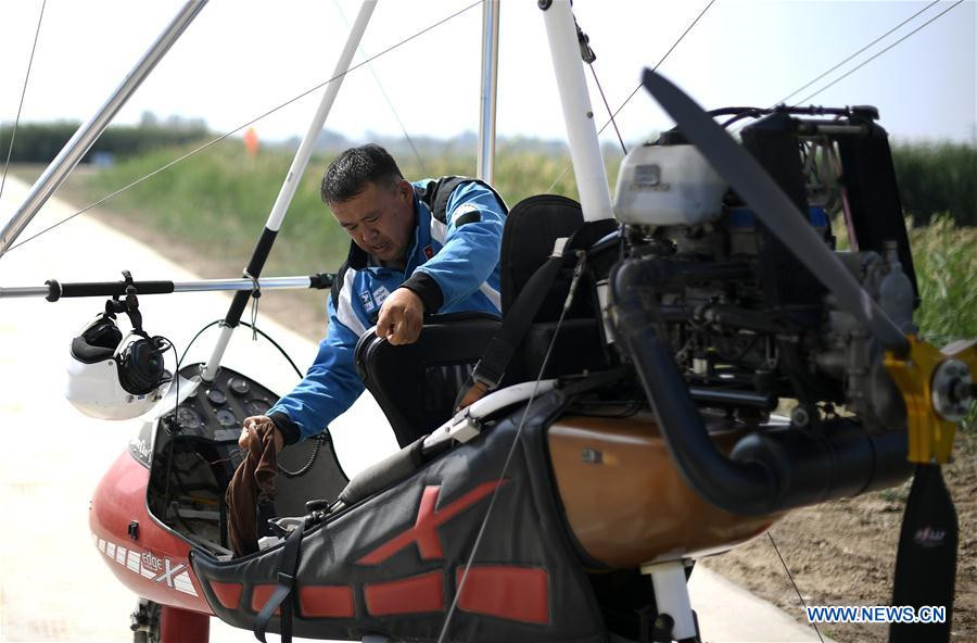 Agricultor chinês compartilha sua paixão por esportes aéreos