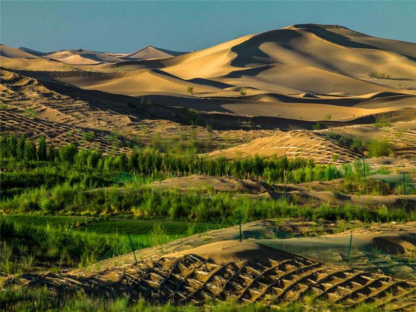 China: Paisagem do deserto de Kubuqi cada vez mais verde