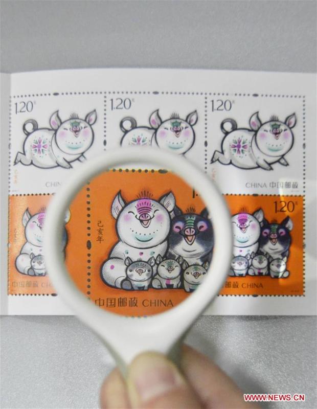 China lançou os selos especiais do zodíaco de homenagem ao Ano do Porco