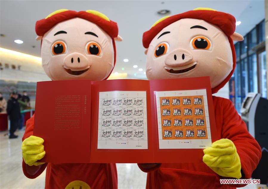 China lançou os selos especiais do zodíaco de homenagem ao Ano do Porco