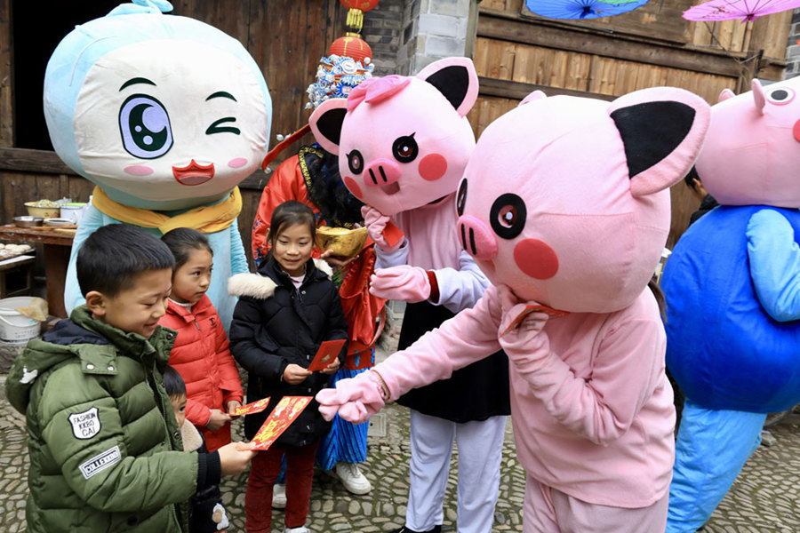 Galeria: Tradições do Ano Novo Lunar na vila antiga de Qiantong
