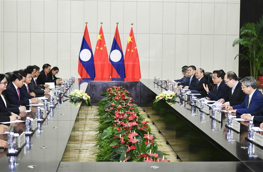 China e Laos prometem fortalecer laços econômicos