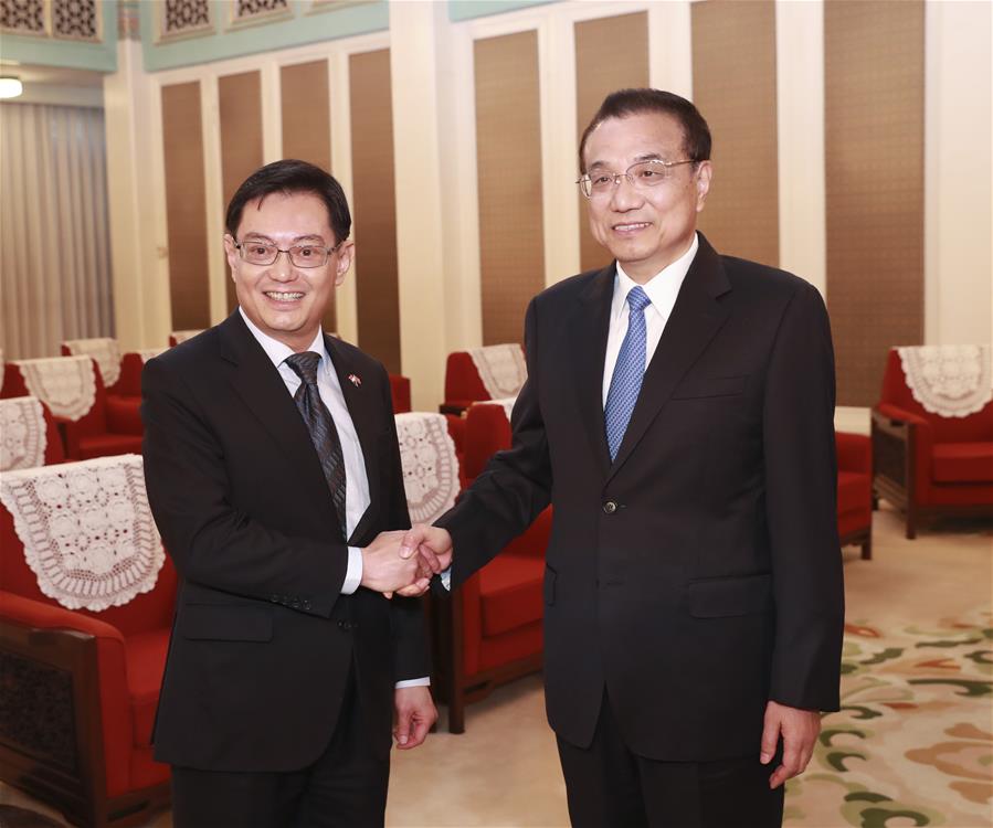 China trabalhará com Cingapura para salvaguardar sistema de comércio multilateral baseado em regras