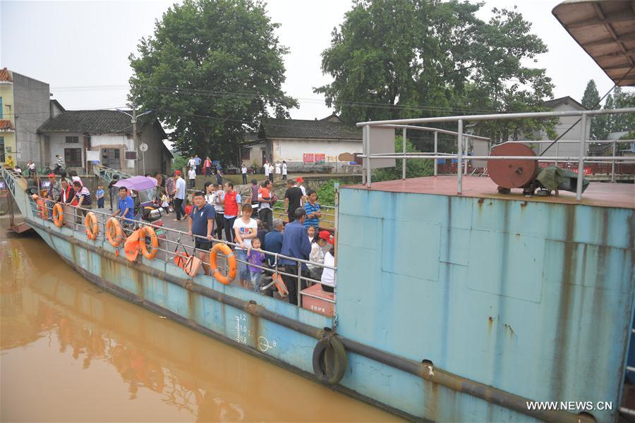 China: Mais de 6.000 pessoas resgatadas na temporada de enchentes