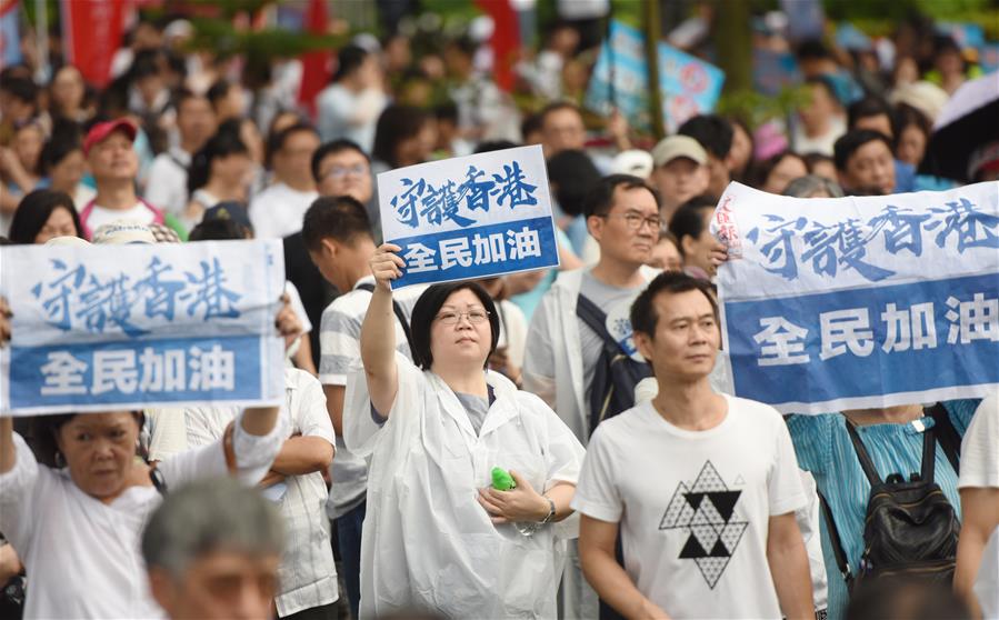 Residentes de Hong Kong organizam comício pedindo paz e estabilidade