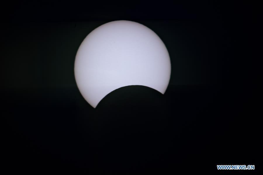 Galeria: eclipse solar parcial em Haikou