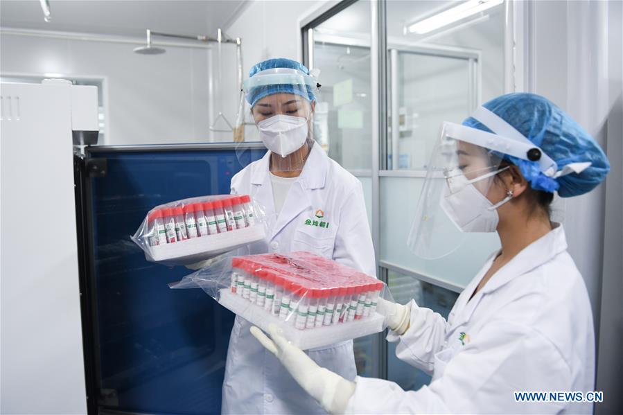 Beijing com capacidade para 300.000 testes de ácido nucleico de Covid-19 por dia


