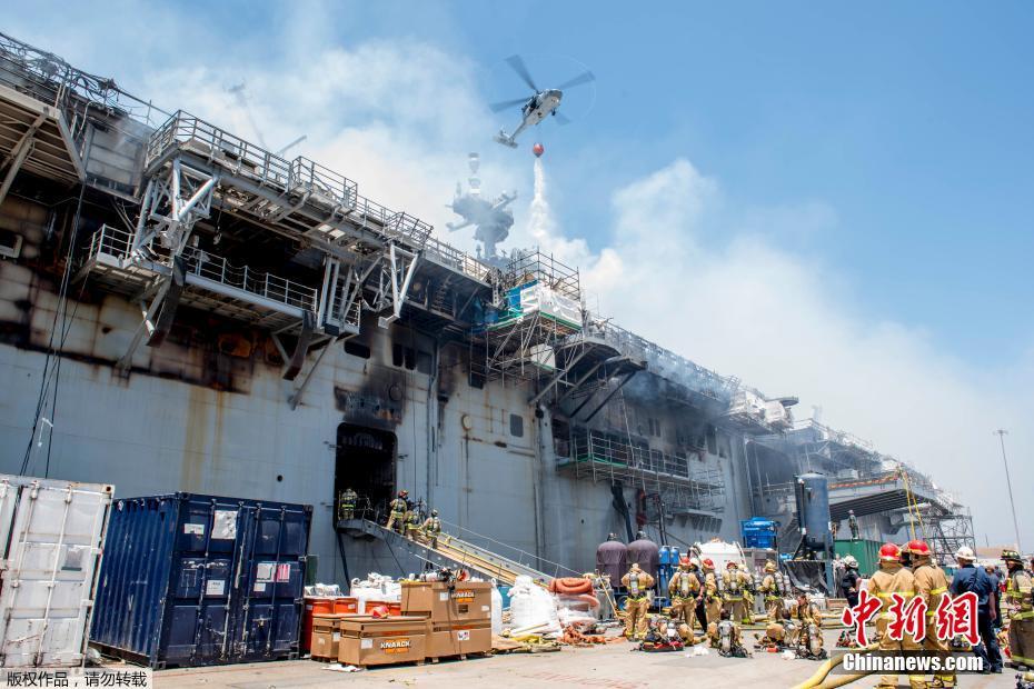 Número de feridos em navio dos EUA em chamas por mais de 48 horas atinge 61
