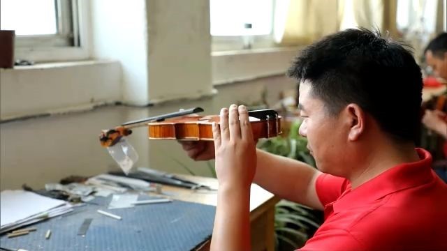 Violinos trazem vida moderadamente próspera para antiga área de base revolucionária da China
