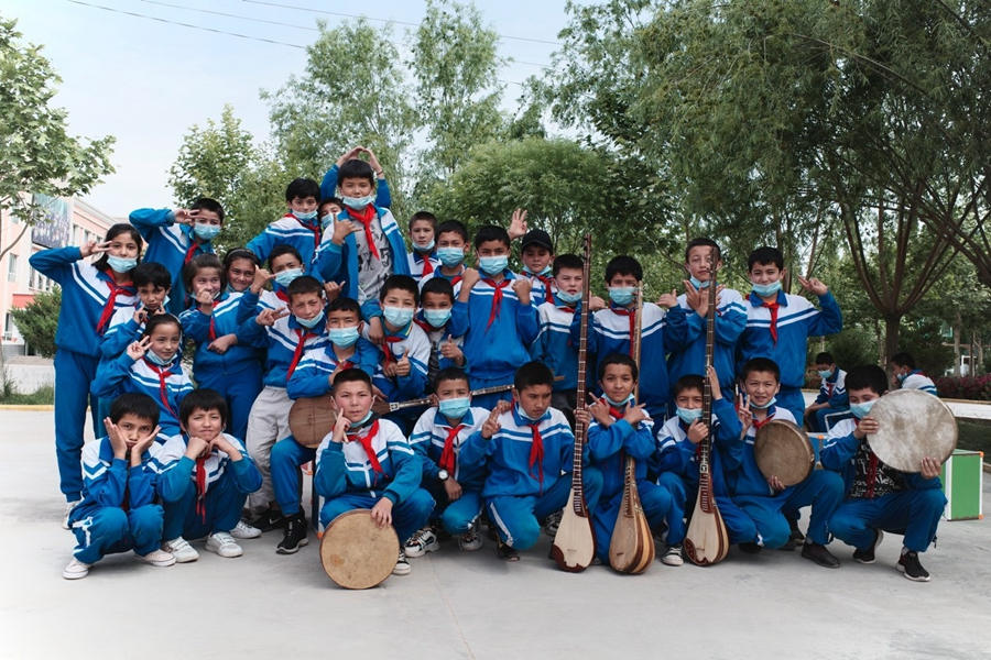 Crianças sorridentes em Xinjiang 
