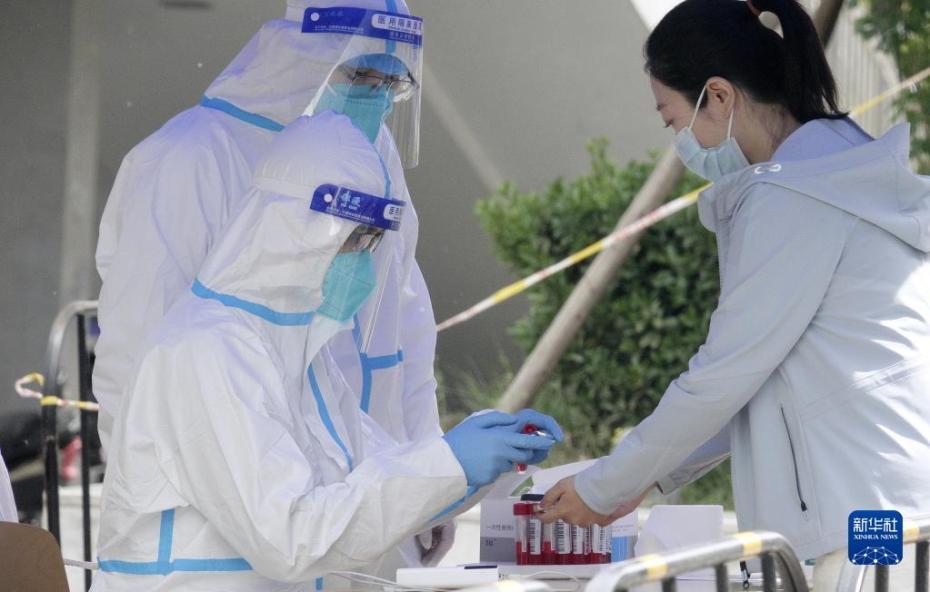 Beijing realiza triagem regional de testes de ácido nucleico para prevenir e controlar pandemia da Covid-19