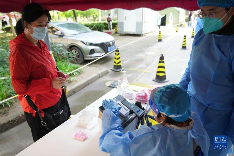 Beijing realiza triagem regional de testes de ácido nucleico para prevenir e controlar pandemia da Covid-19