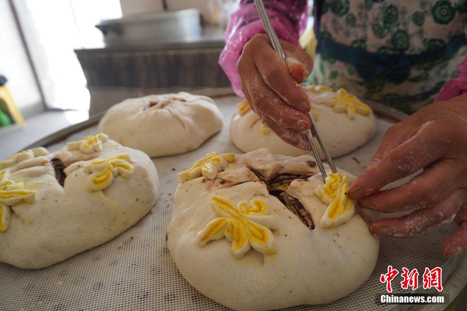 Lanzhou: tradicional bolo da lua mostra habilidades tradicionais 