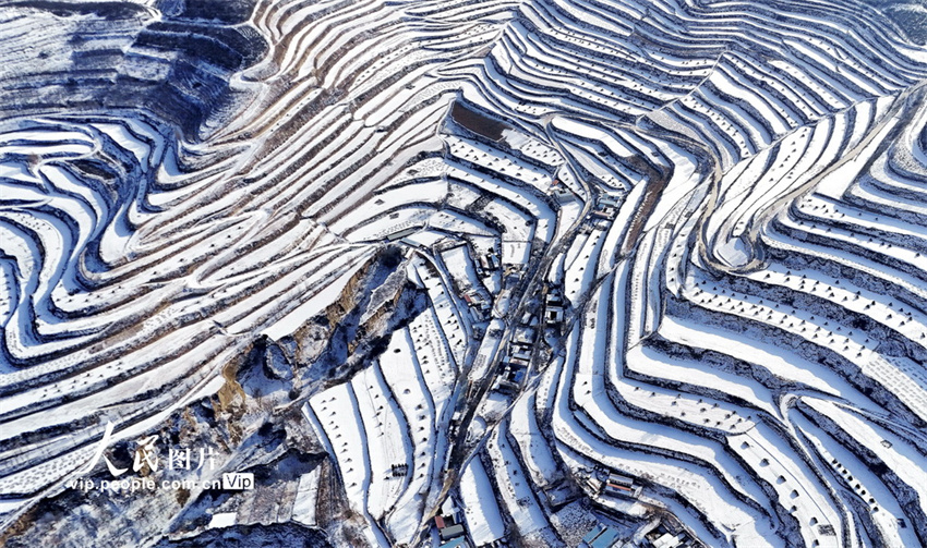 Galeria: paisagem dos terraços após queda de neve em Jingning, Gansu