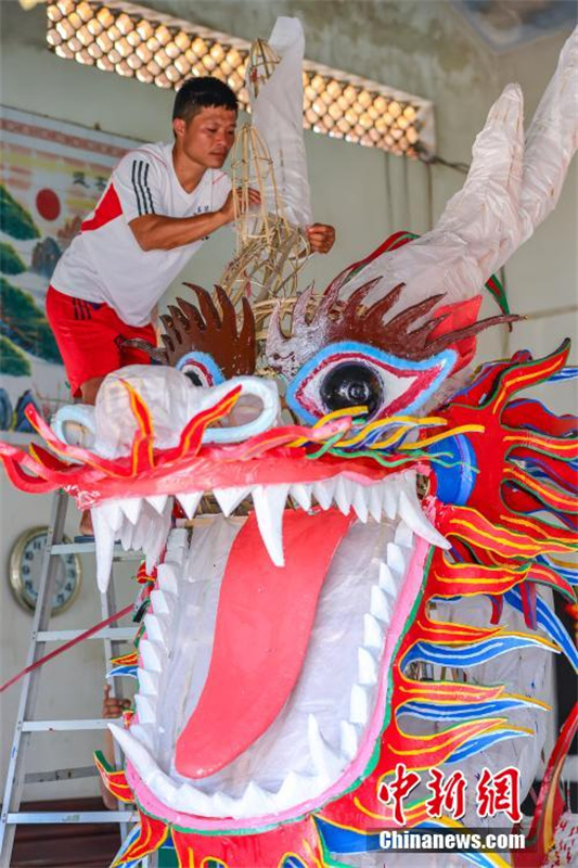 Hainan prepara cabeças de dragão para dar boas-vindas ao Festival do Barco-Dragão