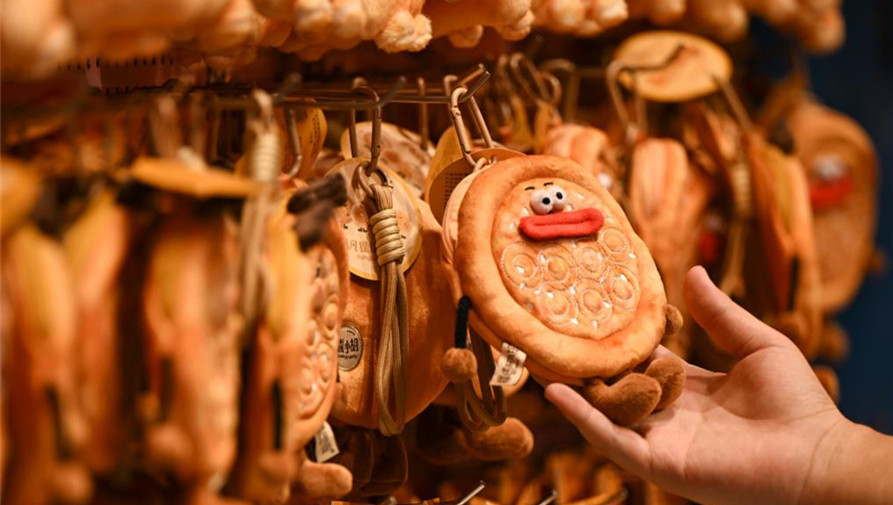 Técnicas tradicionais de fabricação de naan herdadas e desenvolvidas em Xinjiang